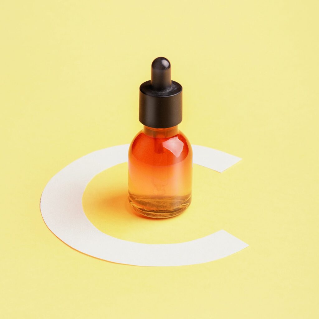 Organic bio cosmetics with vitamin C. Homeopathic oils , dietary supplements. The concept of Minimalism Flat lay
