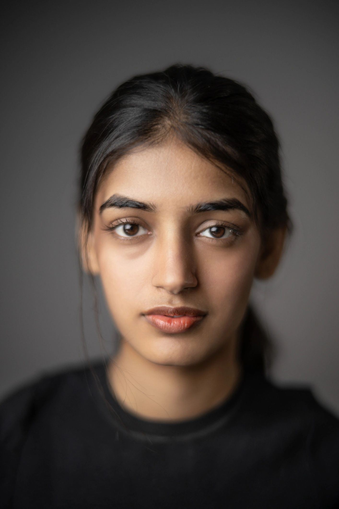 Portrait of a young Indian woman with healthy-looking skin