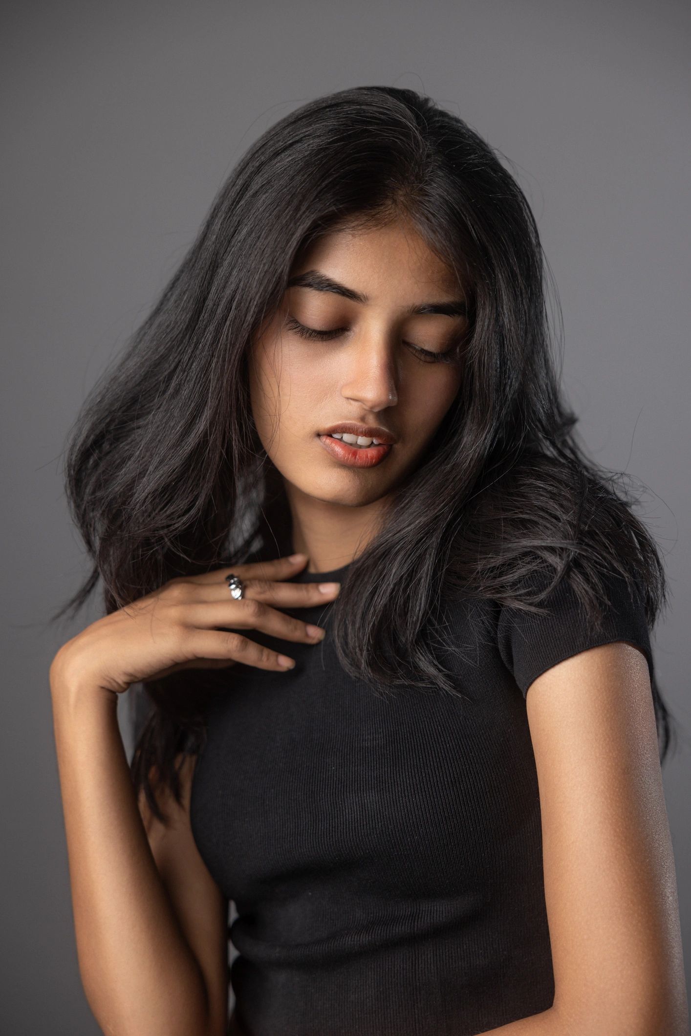 Young Indian woman with a natural, radiant complexion